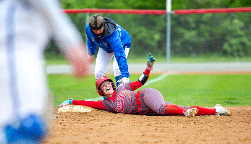 Aspen Peterson’s mood on third base epitomizes all the Houston Hurricanes; very happy. Team double-H beat Schaeffer Academy 25-4, Hayfield 16-6 (above), and then Wabasha-Kellogg 13-3, all by the mercy rule, to book their first trip to Austin and a section final four since 2013. Photo by Emma Geiwitz