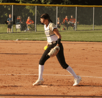 Caledonia pitcher Avery Augedahl concentrates before a pitch versus Randolph in a 1AA semifinal contest. The Warriors’ week had them beating GMLOK 12-0, Lourdes 9-1, losing to the #1 Rockets 1-0, and then topping La Crescent/Hokah 10-0. Behind Augedahl on the mound (24 IP, 10 H, 1 ER, 3 BB, 45 K), the Warriors are a 1AA final four team and heading back to Austin for a second straight year. Photo by Paul Trende