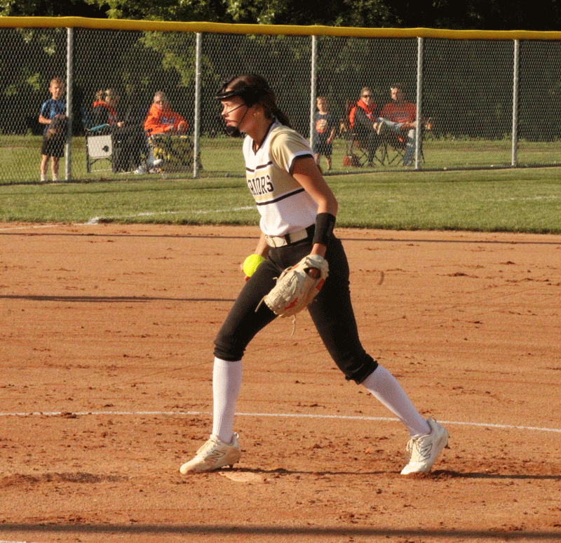 Caledonia pitcher Avery Augedahl concentrates before a pitch versus Randolph in a 1AA semifinal contest. The Warriors’ week had them beating GMLOK 12-0, Lourdes 9-1, losing to the #1 Rockets 1-0, and then topping La Crescent/Hokah 10-0. Behind Augedahl on the mound (24 IP, 10 H, 1 ER, 3 BB, 45 K), the Warriors are a 1AA final four team and heading back to Austin for a second straight year. Photo by Paul Trende