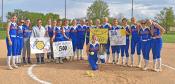 Mabel-Canton junior pitcher Tylar Wenthold poses with teammates after recording her 500th career strikeout in a 2-0 win over GMLOK. She struck out 17 in the game. Photo by Heather Kleiboer