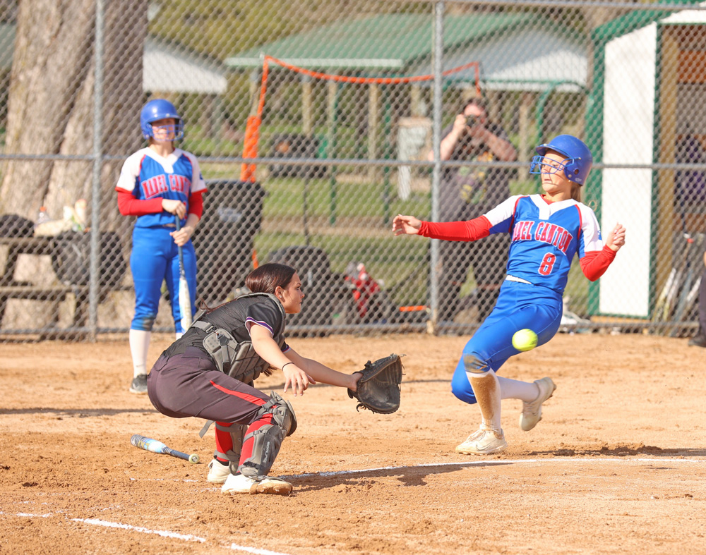 Mabel-Canton’s Kailey Ingvalson presses to score a run but will be tagged out by GMLOK catcher Cheyenne Bakken. But the Cougars rode a 15-strikeout day from Tylar Wenthold to a 4-1 victory, one of three Cougar wins on the week. Photo by Christene Vreeman