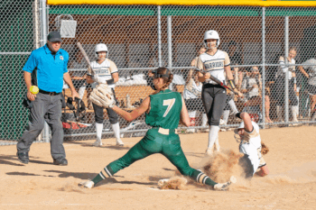 Following an errand pitch, Caledonia’s Nora Staggemeyer comes home to score ahead of the ball and tag by Rushford-Peterson’s Shelby Tesch. The Warriors went 3-1 on the week, losing a TRC-East deciding contest to La Crescent/Hokah 5-1, but topping Winona 9-1, R-P 10-1, and Z-M 15-1. Photo by Dawn Hauge