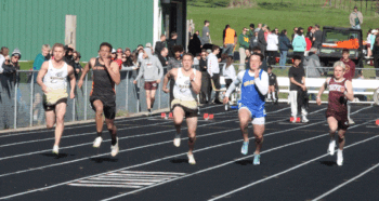 Caledonia/Spring Grove’s Eli Staggemeyer (left) and Fischer Wait plus Chatfield’s Logan Pearson (far right) compete with two others in the 100-meter dash at the St. Charles track and field meet. Wait just edged Saint Christopher Hilton (second from left) with Staggemeyer taking fourth. Photo by Paul Trende