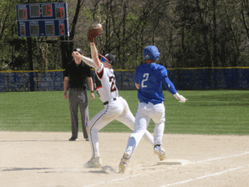 Spring Grove’s Brandon Jahnke cannot come up with the throw to first to get Mabel-Canton’s Tyler Larson. The Cougars came up with five runs in the bottom of the sixth to post a 6-5 win, sweeping the season series. Photo by Paul Trende