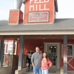 The husband and wife team of Annie Kang and Adam McCabe are the new owners of Stone Mill Hotel & Suites. Photo by Barb Jeffers