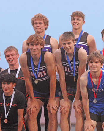 Turning in one of many top 1A meet performances was the GMLOKS boys 4x400 (back Zach Reiland and Carter Glynn, front Kaleb Yunker and Tate Goergen), which was section champ. Goergen (800-meters) also did so individually while Reiland (300-hurdles) also made state. Photo by Paul Trende