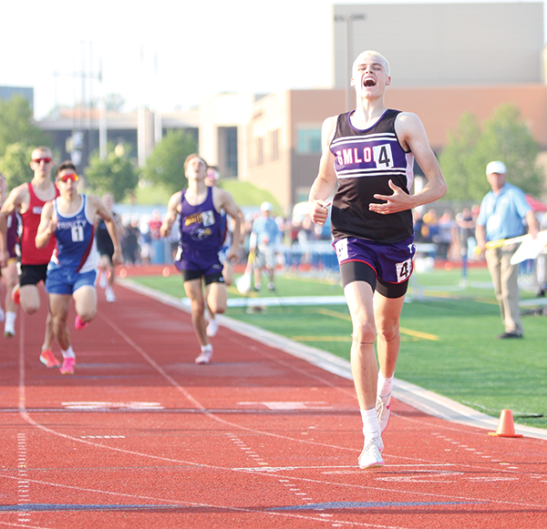 GMLOKS sophomore Tate Goergen passes the finish line well in front of his foes to win the Class A 800-meter state title. Goergen’s performance was one of two area state titles at the Class A State Track and Field Meet. Photo by Paul Trende