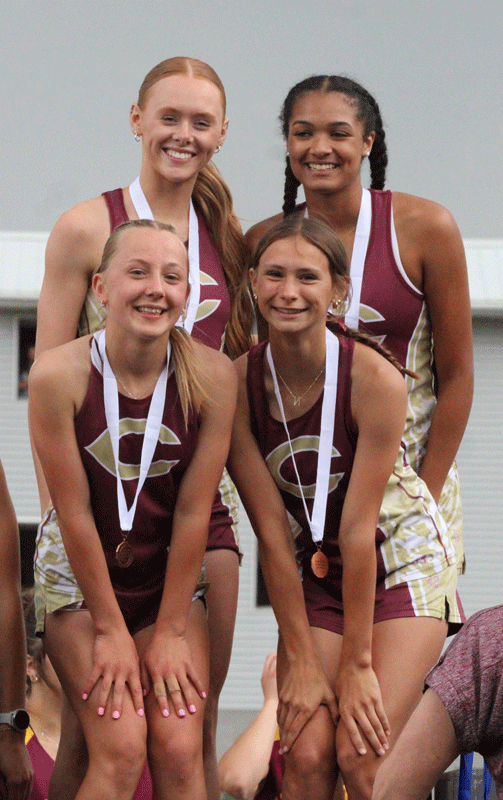Qualifying for state by standard was the Chatfield girls’ 4x100 team (back Jaelyn LaPlante and Savannah Peterson, front Adeline Schild and Natalie Davidson), which took third at the 1A meet. LaPlante triple qualified (200-meters, Long Jump) while Peterson did so twice (200-meters). Photo by Paul Trende