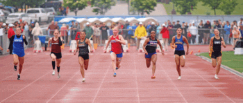 GMLOKS’ Chantle Reiland (third from right) sprints hard in the finals of 100-meters at the state track and field meet. The 2023 champ took third to Hills-Beaver Creeks’ Brynn Bakken and Bagley/Fosston’s Ava Phrankonkham (each to Reiland’s right). Reiland wrapped up a 15-time state qualifier career with three more trips to state podium (100, 200, 4x200). Photo by Paul Trende
