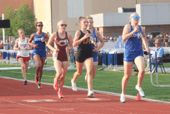 Competing at the state meet in the 1,600-meters were LFCMC’s Autumn Rakosnik (#5) and Chatfield’s Charli Oeltjen (#6), as they run just behind’s Cotter/HL’s Sonja Semling (#2). Rakosnik and Oeltjen each made the state podium, taking sixth and ninth respectively. Photo by Paul Trende
