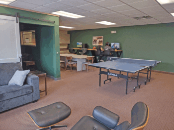 Student center room that offers computers, ping pong table, board games and more!