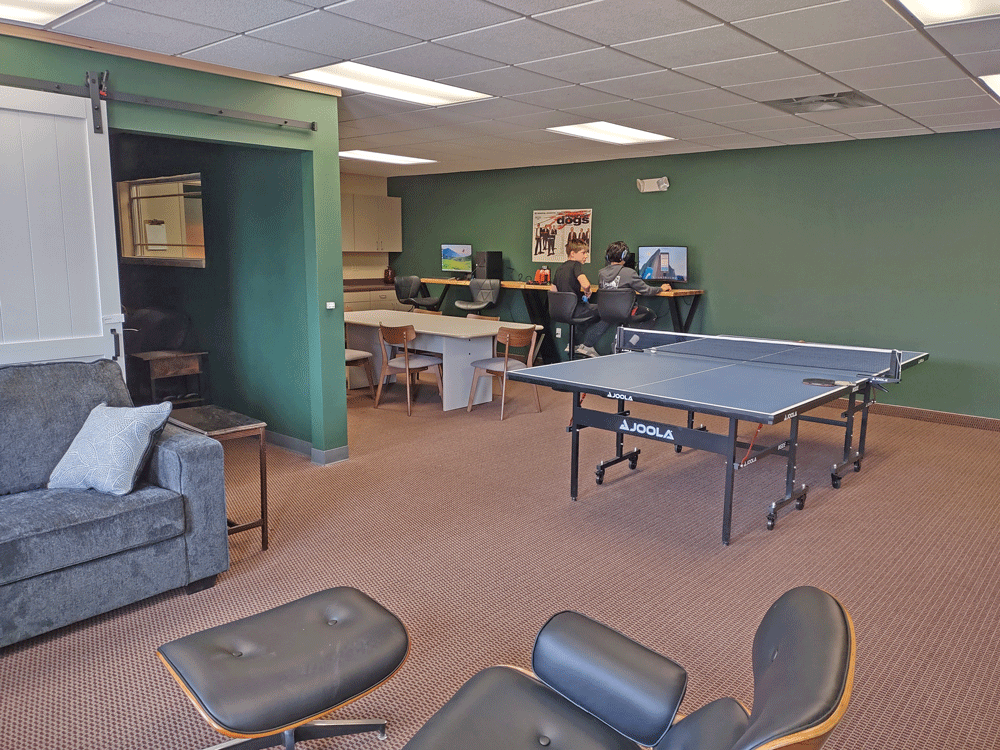 Student center room that offers computers, ping pong table, board games and more!