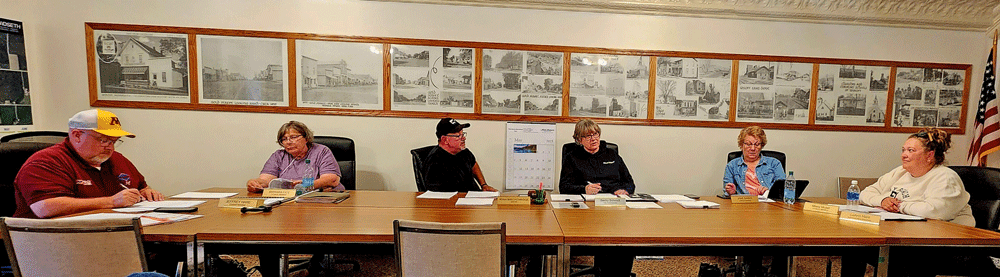Wykoff City Council members discuss upcoming street repairs, ballpark electrical upgrades, and the approval of a grant for a new library and municipal space during their June 9 meeting. Photo by Zech Sindt
