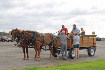 Horse-drawn wagon rides were a nice ride for many at Olmsted County Breakfast on the Farm 2025.
