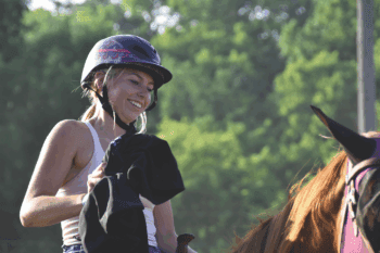 Lauren Olson, a Fillmore County 4-H horse project member, is recognized for always smiling when working with her horse. Photo by Charlene Corson Selbee