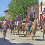 The Fillmore County Fair Drill Team carries the red, white, and blue in community parades. Photo submitted