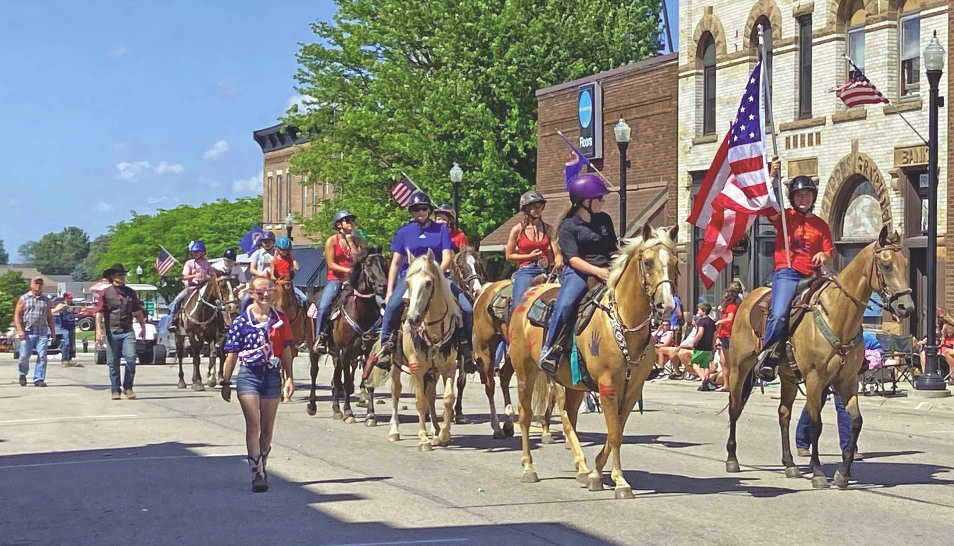 The Fillmore County Fair Drill Team carries the red, white, and blue in community parades. Photo submitted