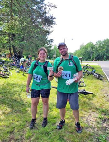 Carin and Josh show off their memento magnets after The Stubborn Mule, their first adventure race. Photo submitted