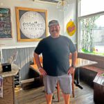 Matt Brown proudly poses in Estelle’s main dining room.