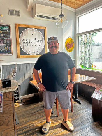 Matt Brown proudly poses in Estelle’s main dining room.