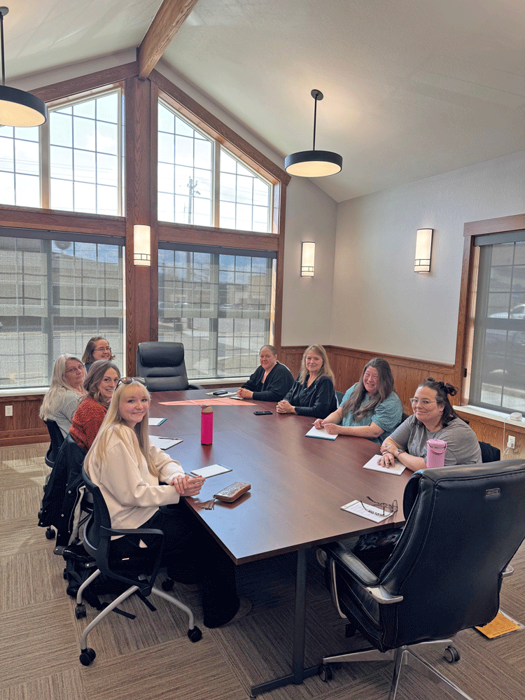 Maple Leaf Services supervisors in a meeting. Starting on the left side-clockwise: Elizabeth Miller, Amy Tweten, Jamie Blaney, Angela Waters, Janette Vandezande, Rebecca Tostenson, Wendy Kryzer, Jessica Muras. Not pictured: Julane Gehrking. Photo submitted