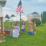 Prairie School begins with the Pledge of Allegiance. Photo by Hannah Wingert