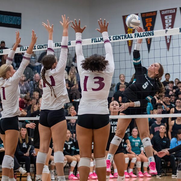 Fillmore Central’s Lauren Dahly encounters the triple block of Chatfield defenders Trindy Barkeim (#1), Julia Goldsmith (#11), and Amaya Harmening (#13). In a battle of the #3 teams in Class A and Class AA, FC ended Chatfield’s two-plus year TRC win-streak via 3-1 final. Photo by Leif Erickson