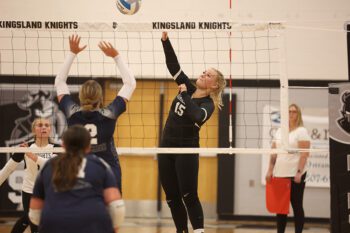 Caisa Kolling attacks in Kingsland’s match with Glenville-Emmons. The Knights picked up their first win of the year in four sets over the Wolverines (22-25, 25-19, 25-14, 25-19). Photo by Christine Vreeman