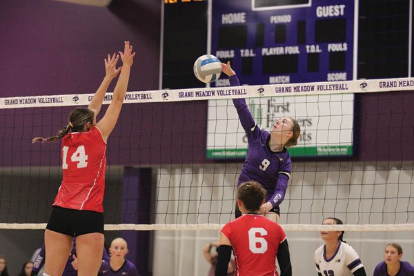 Grand Meadow’s Alyvia Olson is on the attack against the defense of Houston’s Jorja Meyer. The Larks posted a 6-0 week including two SEC wins, as GM (7-0, 15-4) is off to a big start and a big lead over nearest foe Southland (6-3, 6-3) in the SEC-West. Photo by Paul Trende