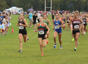 LFC’s Autumn Rakosnik is out with the leaders early at the Luther All-American invite. Featuring many ranked teams and runners from the Tri-State area, Rakosnik took an impressive ninth place. She is ranked #8 in Class A in Minnesota. Photo by Paul Trende