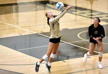 Caledonia’s Aubrie Klug does what she does and defends an attack in Caledonia’s match with La Crescent/Hokah (with Ashlyn Reinhart also pictured). The #6 in Class AA Warriors downed the Lancers and Zumbrota-Mazeppa in non-tourney games on the week, then went 3-1 at the Apple Valley Invite. The Warriors (3-0, 9-1) are tied with FC (3-0, 6-2) atop the TRC. Photo by Craig Johnson