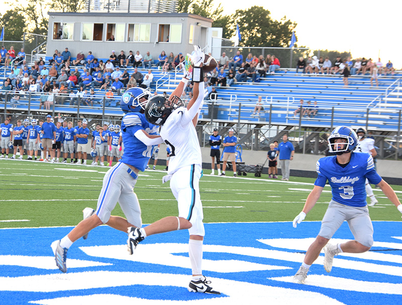 Fillmore Central’s Quinci Kaase makes the nice TD reception to start Fillmore Central’s scoring in their Thursday season-opening win over Janesville-Waldorf-Pemberton, 50-18. Photo by Deb Finseth