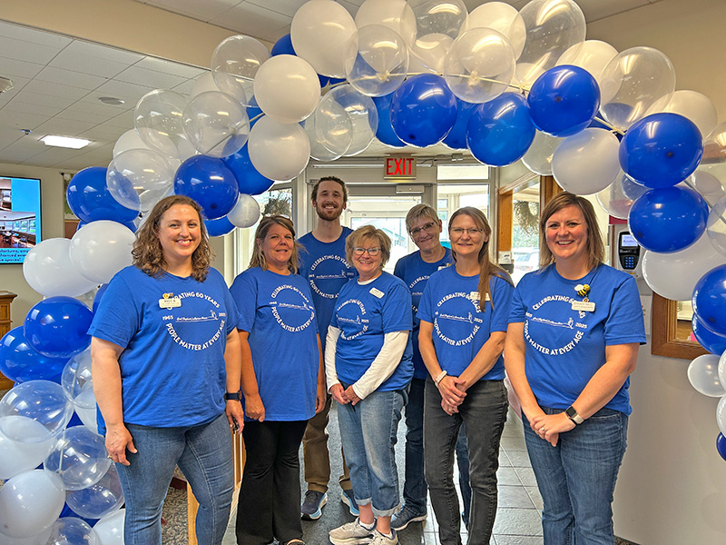Some of the administrative staff at the celebration, from left to right: Angie Buytaert, Childcare director; Shelly Atkinson, Food Services director; Spencer Klausing, Therapeutic Recreation director; Sandy Hanson, Social Services director; Rhonda Spece, CFO; Shelly Stensgard, director of Nursing; Samantha Colbenson, campus administrator. Photo by Wanda Hanson
