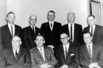 The first Good Shepherd Board seated from left to right: Elvin Humble, Rushford; Bertram Boyum, Utica; Kenneth Olson, rural Houston; and Darrell Benson, Lewiston. Standing from left to right: Rev. Percy Larson, rural Lanesboro, Milton Knutson, Winona; Evan Engebretson, Whalan; Rev. James Asp, Peterson; Winton Christenson, Rushford. Photo submitted