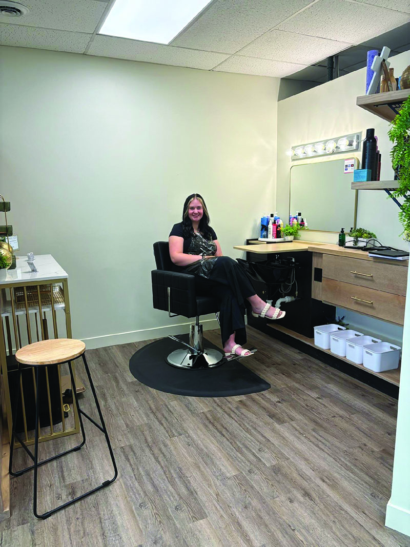 Grace Kennedy relaxes before the first day of her return to her salon. Grace’s salon Style & Smile is one of the salons in the Lavender & Sage Salons in St. Charles. Photo submitted