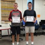 C.J. Wruck, left, and Coleman Peterson, right, were honored as Hurricane Heroes. Photo by Wanda Hanson