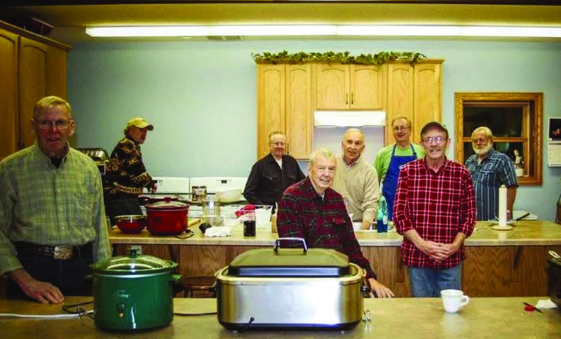 The men’s group serving a New Year’s Eve pancake supper at the church. Photo submitted