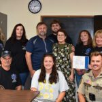 WinnMed Director of Ambulance, Steve Vanden Brink, recognized EMS personnel for their life-saving response after Kala Exworthy suffered a sudden cardiac arrest. Her fiance Rory Welper, along with family, were present to witness the recognition. Front row, left to right: Jason Marquardt, Dispatcher Courtney Nelson, and Fillmore County Deputy Jordan Rudolph. Second row: Shelly Gerard, Mabel Ambulance Director Sarah Mengis, Rory Welper, Kala Exworthy, Jeanette Paul, and Sheri Marquardt. In back is Travis Vatland. Photo by Charlene Corson Selbee