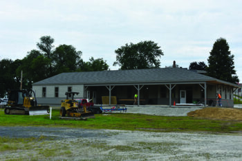 Contractors are hard at work completing the renovation of the Preston Dairy and Farm building before the October 4 soft grand opening. Photo by Charlene Corson Selbee