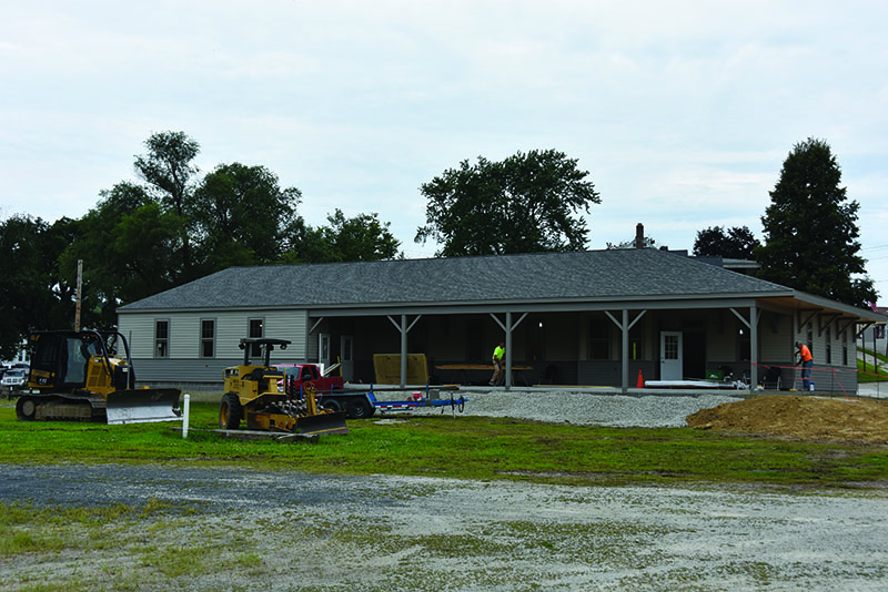 Contractors are hard at work completing the renovation of the Preston Dairy and Farm building before the October 4 soft grand opening. Photo by Charlene Corson Selbee