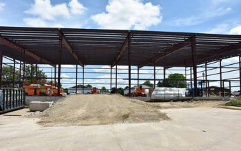 The site of the October 14, 2023, fire at 131 Bissen Street, now being rebuilt as a new distribution center. Photo by Charlene Corson Selbee