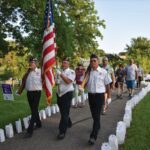 The Color Guard leads cancer survivors on the first lap of a previous Relay for Life walk. Photo submitted