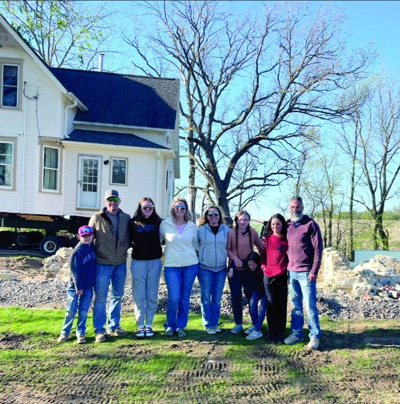 The house is ready to move. From left to right: Cole, Brent, Marissa and Brenda Afseth; Cassandra (Sandy), Emma, Holland (in front), Blaise and Theo Haddad. Photo submitted
