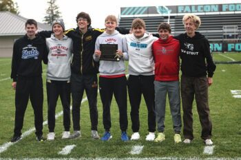 The 2025 Three Rivers Conference Meet boys (repeating) team champion squad from Lewiston-Altura/Rushford-Peterson/Houston (left to right): Brennan Kunst, Will Jewison, Aaron Ploetz, Isaac Rasmussen, Trey Hegland, Grayson Speltz and Hunter Rislov. LARPH topped Cotter/Hope Lutheran 30 to 35 with all the above runners finishing top 13 (of 117 total competitors). Photo by Paul Trende