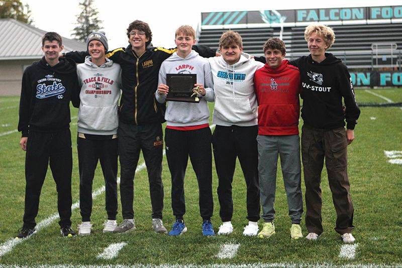 The 2025 Three Rivers Conference Meet boys (repeating) team champion squad from Lewiston-Altura/Rushford-Peterson/Houston (left to right): Brennan Kunst, Will Jewison, Aaron Ploetz, Isaac Rasmussen, Trey Hegland, Grayson Speltz and Hunter Rislov. LARPH topped Cotter/Hope Lutheran 30 to 35 with all the above runners finishing top 13 (of 117 total competitors). Photo by Paul Trende
