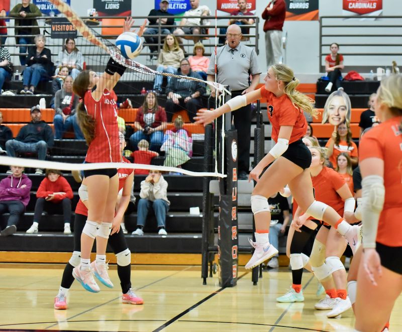 Lanesboro’s Sari Rein gets a little help from the net in sending a ball across versus Houston. The Burros won the match 3-0, avenging a 3-2 loss to the Hurricanes earlier this year. Photo by Ron Mayer