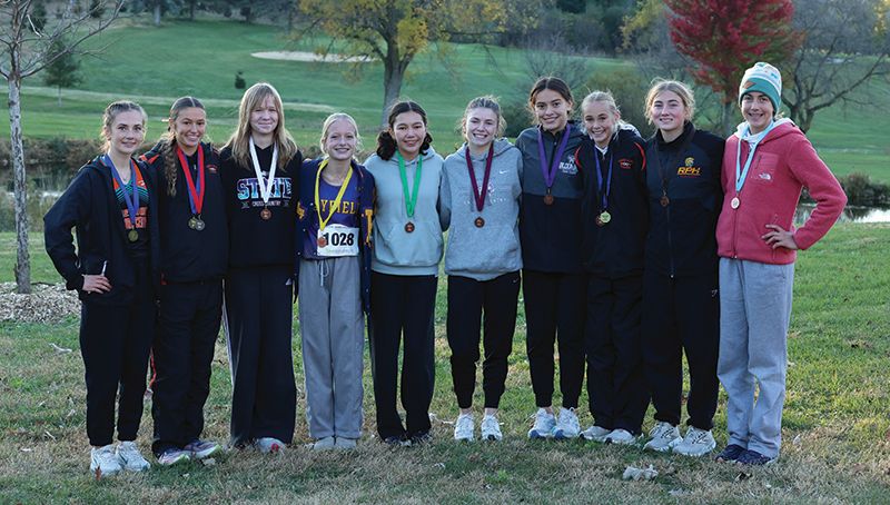 The Section 1A Meet top 10 girls finishers. Heading the cast is LFC’s Autumn Rakosnik (far left), who was meet champion. LARPH’s Caitlin Bauer (second from right) took ninth and was one spot short of making state. Photo by Christine Vreeman