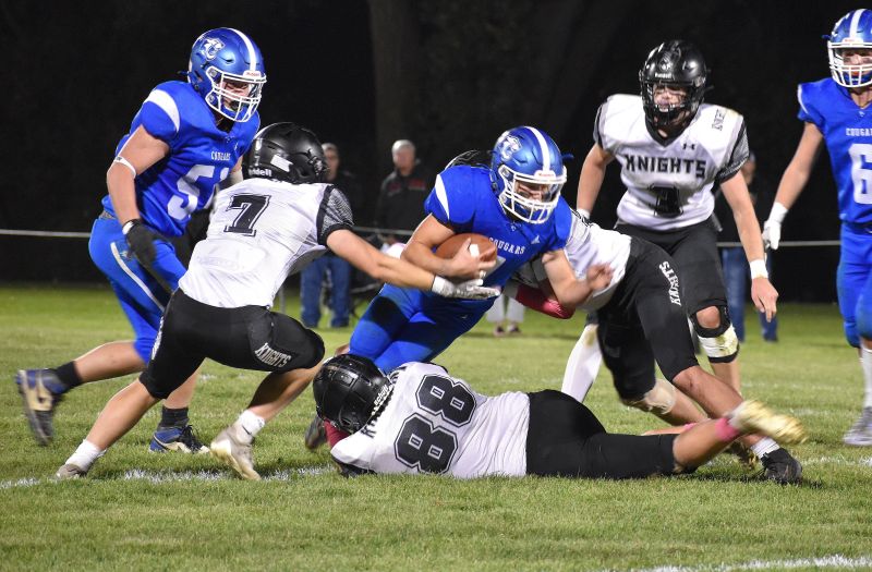 Mabel-Canton’s Kale Tollefsrud churns forward as three Kingsland defenders including Michael Johnson (#7) and Sawyer Willford (#88) converge on the tackle. M-C improved to 7-0 and won the South-East sub-district title via a 43-8 win. Photo by Heather Kleiboer