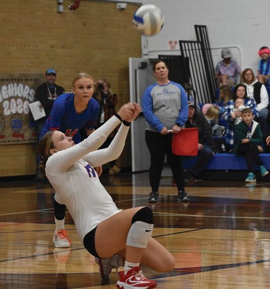 Mabel-Canton libero Lauren Burke pops up an attack in the Cougars’ Round of 16 volleyball match with Houston. Via 3-0 sweep, #6 in Class A M-C moved on to the 1A quarterfinals in Rochester. Photo Heather Kleiboer