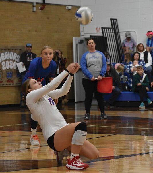 Mabel-Canton libero Lauren Burke pops up an attack in the Cougars’ Round of 16 volleyball match with Houston. Via 3-0 sweep, #6 in Class A M-C moved on to the 1A quarterfinals in Rochester. Photo Heather Kleiboer